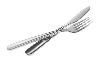 Fork and knife isolated on white. Stylish shiny cutlery set