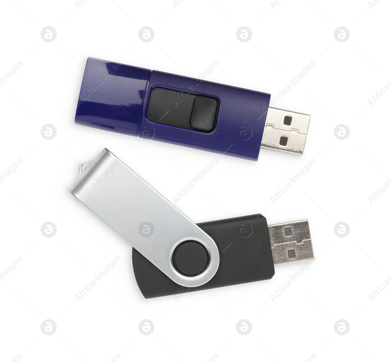 Photo of Modern usb flash drives on white background, top view