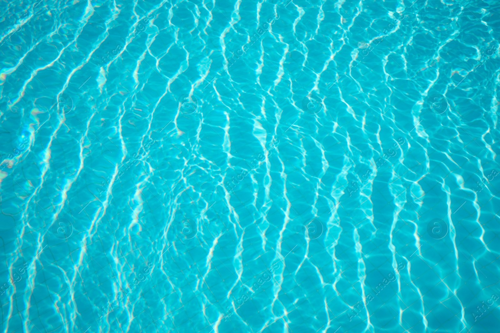 Photo of Clear water in outdoor swimming pool on sunny day