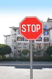 Post with Stop sign on city street