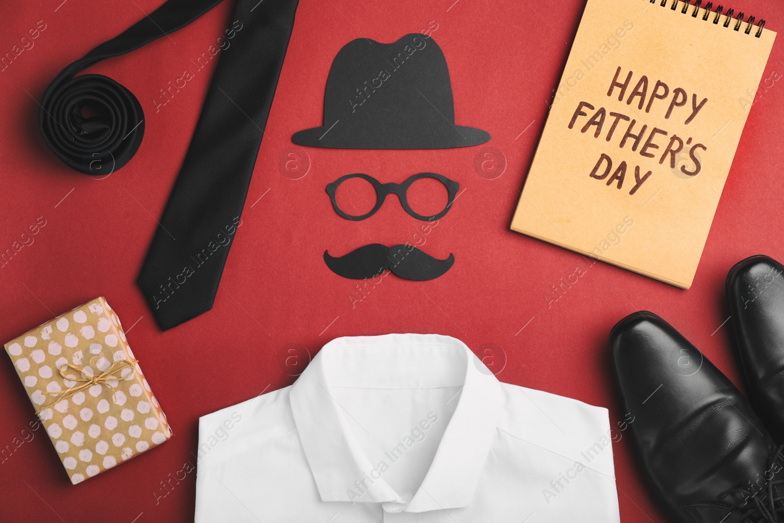 Photo of Flat lay composition with shirt, shoes and paper decor on color background. Happy Father's Day