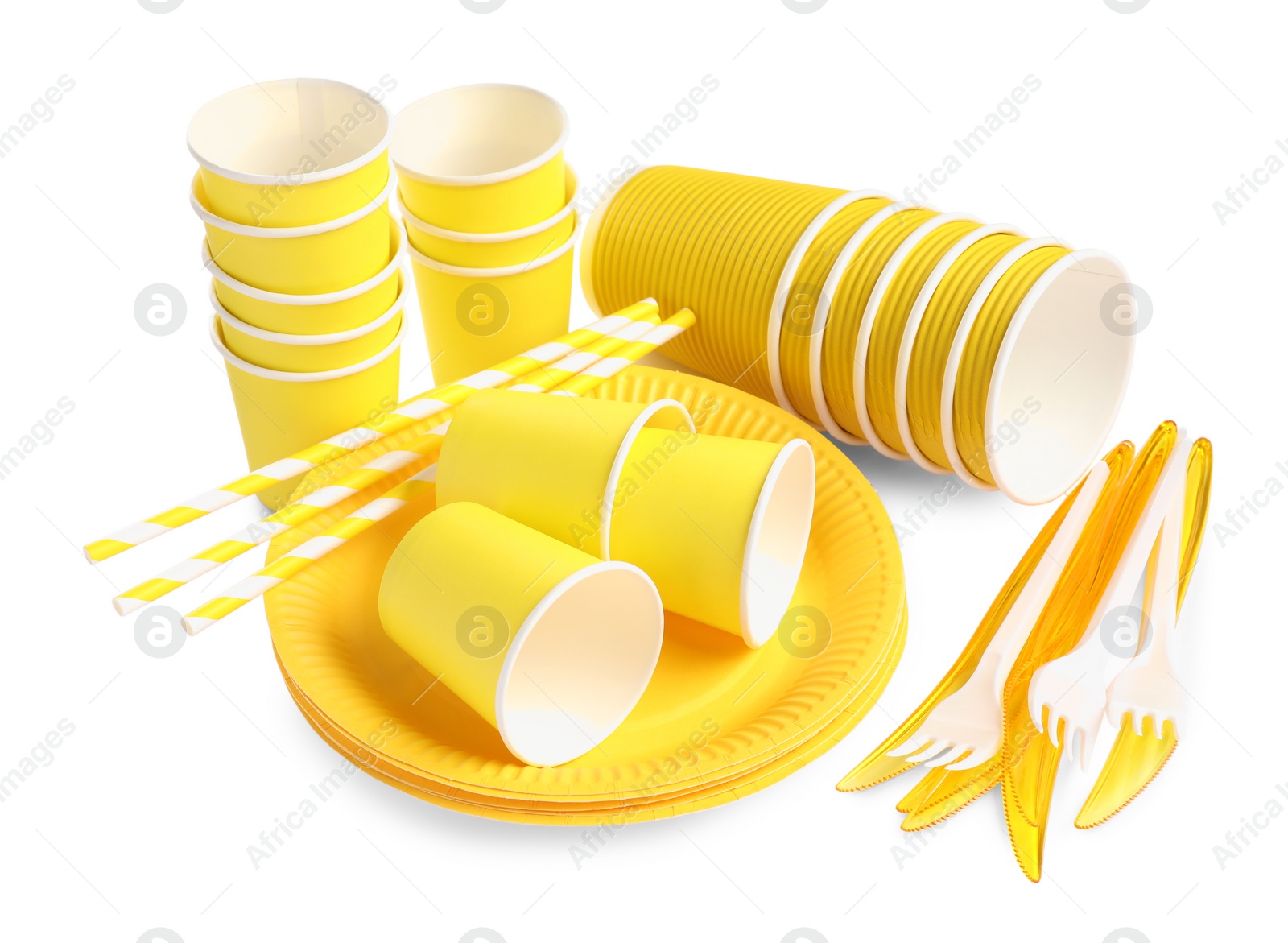 Photo of Set of bright disposable tableware on white background