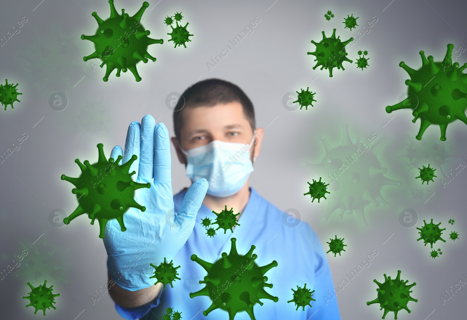 Image of Be healthy - boost your immunity. Doctor in protective mask showing stop gesture to viruses, focus on hand