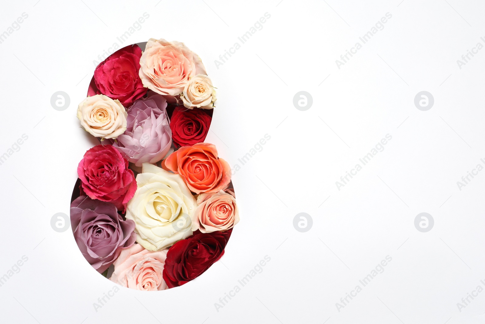 Photo of 8 March greeting card design with roses and space for text, top view. Happy International Women's Day