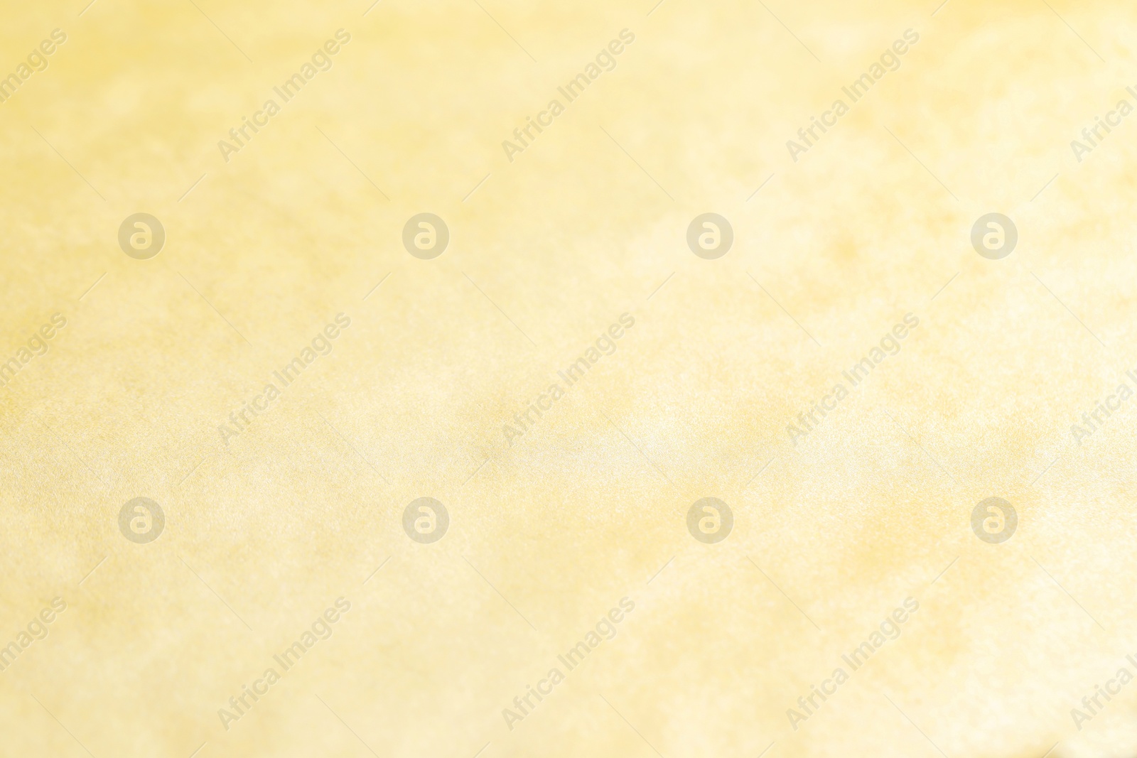Photo of Beautiful golden textured surface as background, top view
