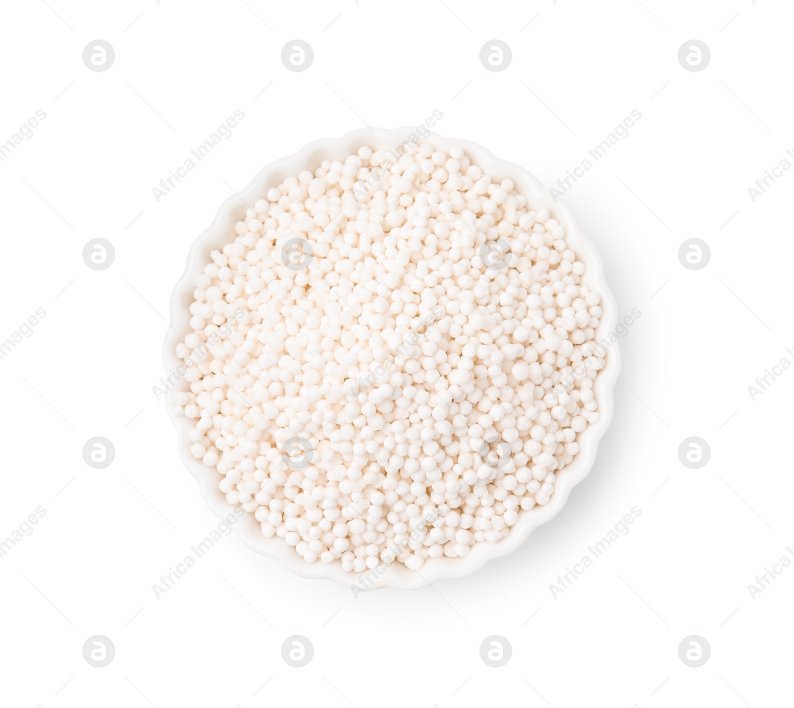 Photo of Tapioca pearls in bowl isolated on white, top view
