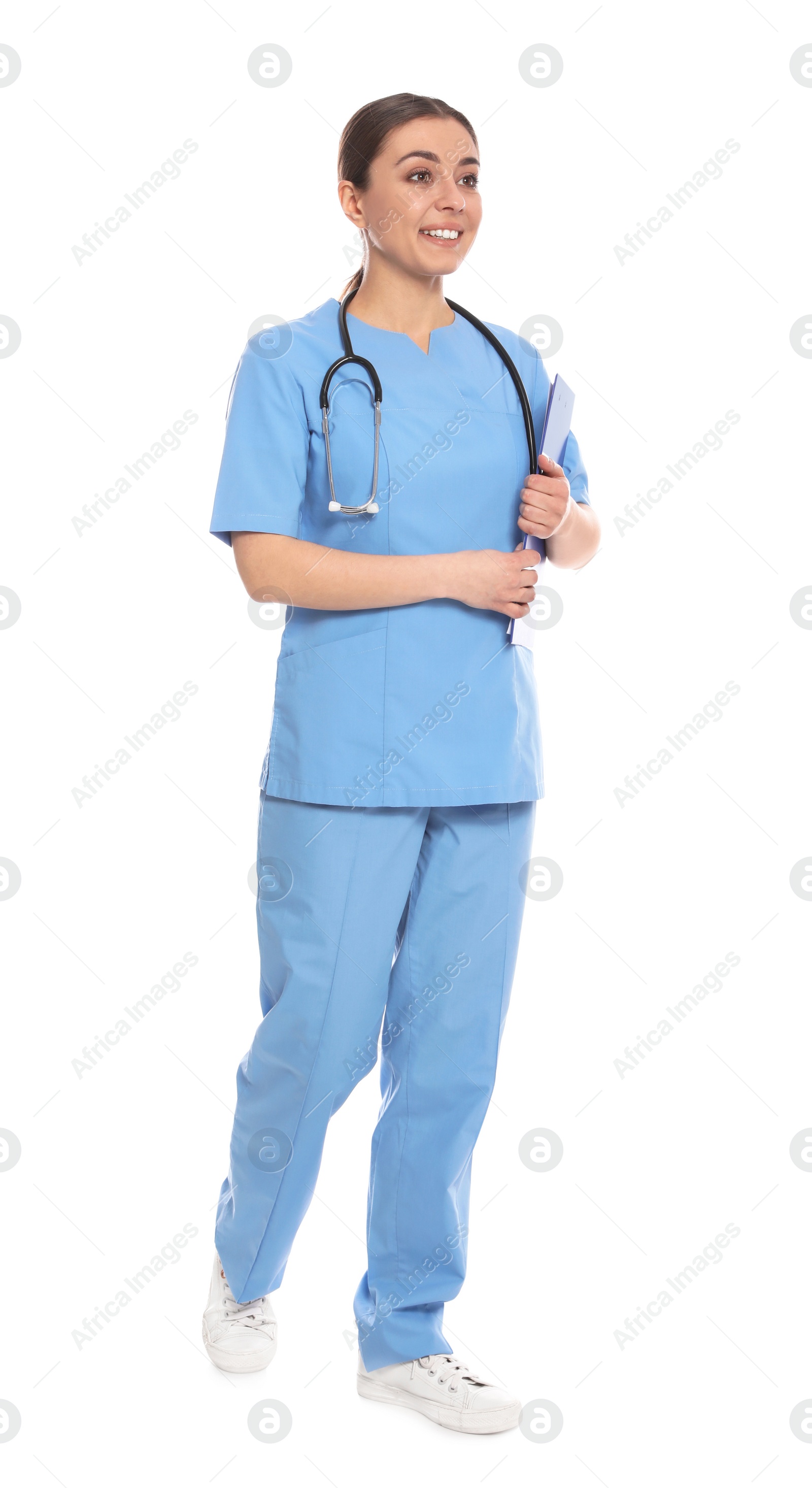 Photo of Full length portrait of medical doctor with clipboard and stethoscope isolated on white