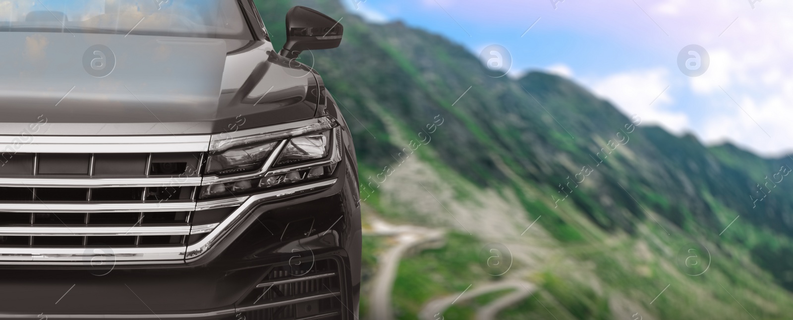 Image of Road trip. Car driving near mountains, banner design 