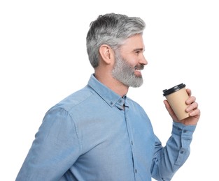 Mature businessman in stylish clothes with cup of drink posing on white background