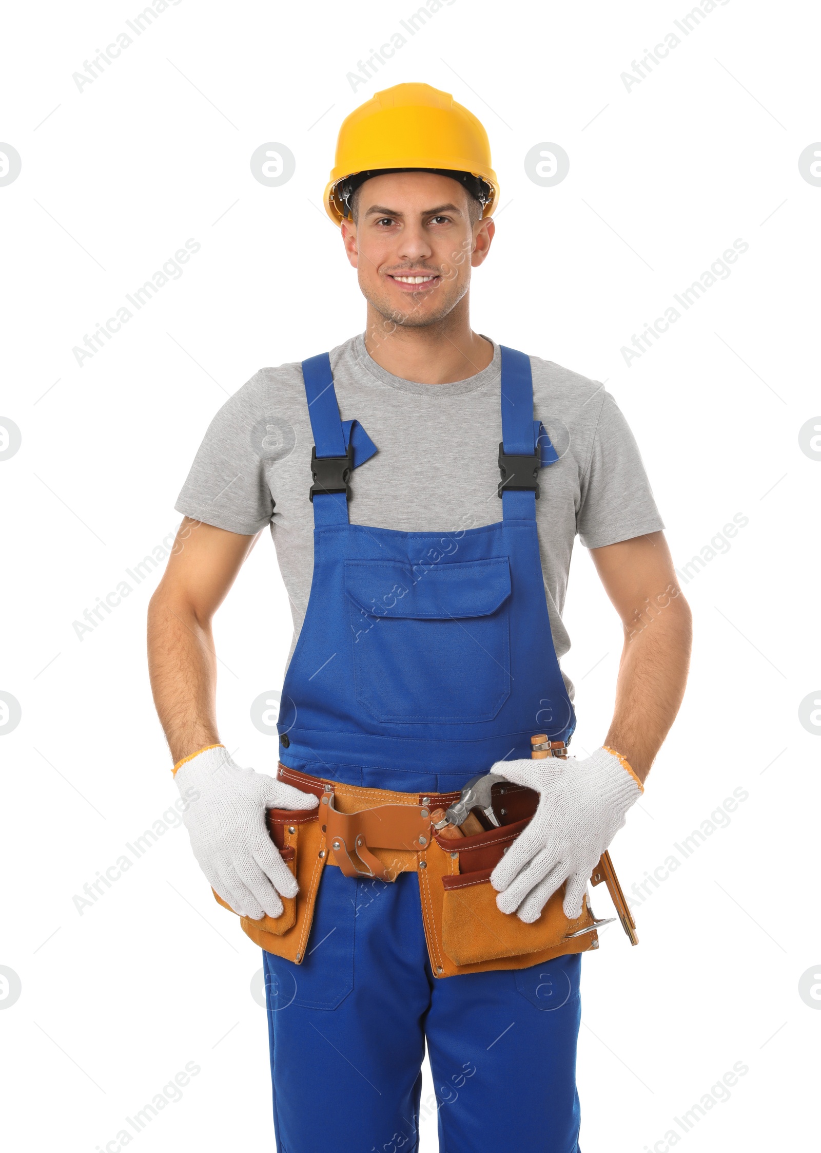 Photo of Handsome carpenter in hard hat isolated on white