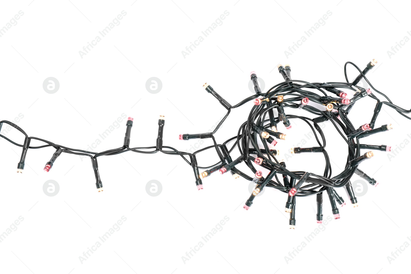 Photo of Beautiful Christmas lights on white background, top view