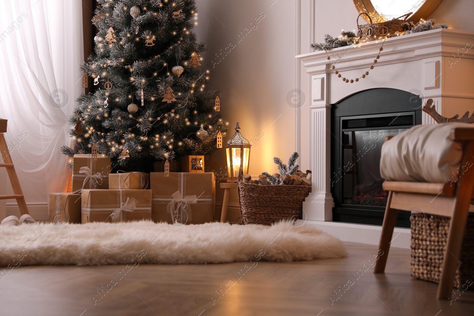 Photo of Beautiful room interior with Christmas tree and fireplace