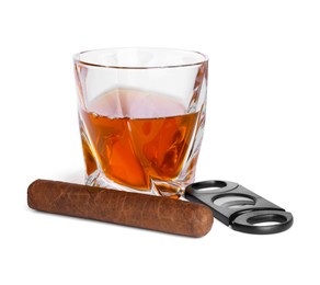 Photo of Glass of whiskey, cigar and cutter isolated on white