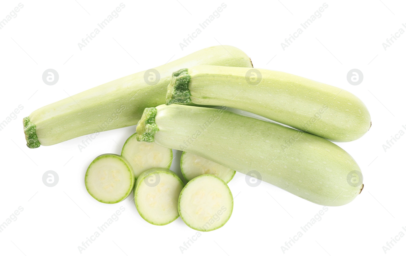 Photo of Fresh ripe green zucchinis isolated on white, top view