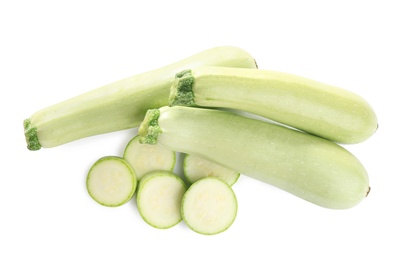 Fresh ripe green zucchinis isolated on white, top view