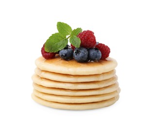 Photo of Delicious pancakes with berries, honey and mint isolated on white