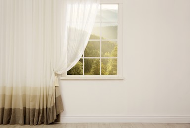 Beautiful view of mountain landscape through window