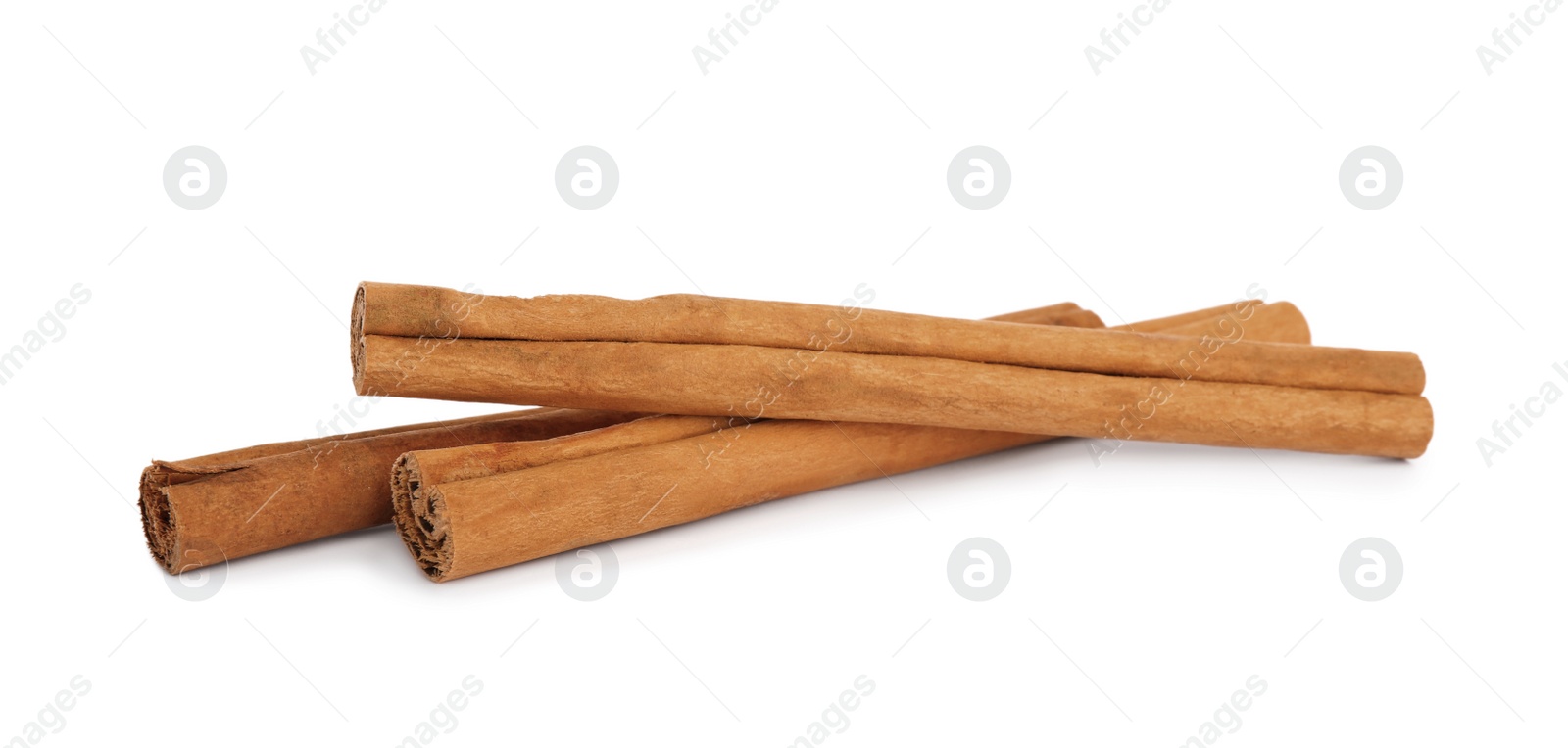 Photo of Aromatic dry cinnamon sticks on white background