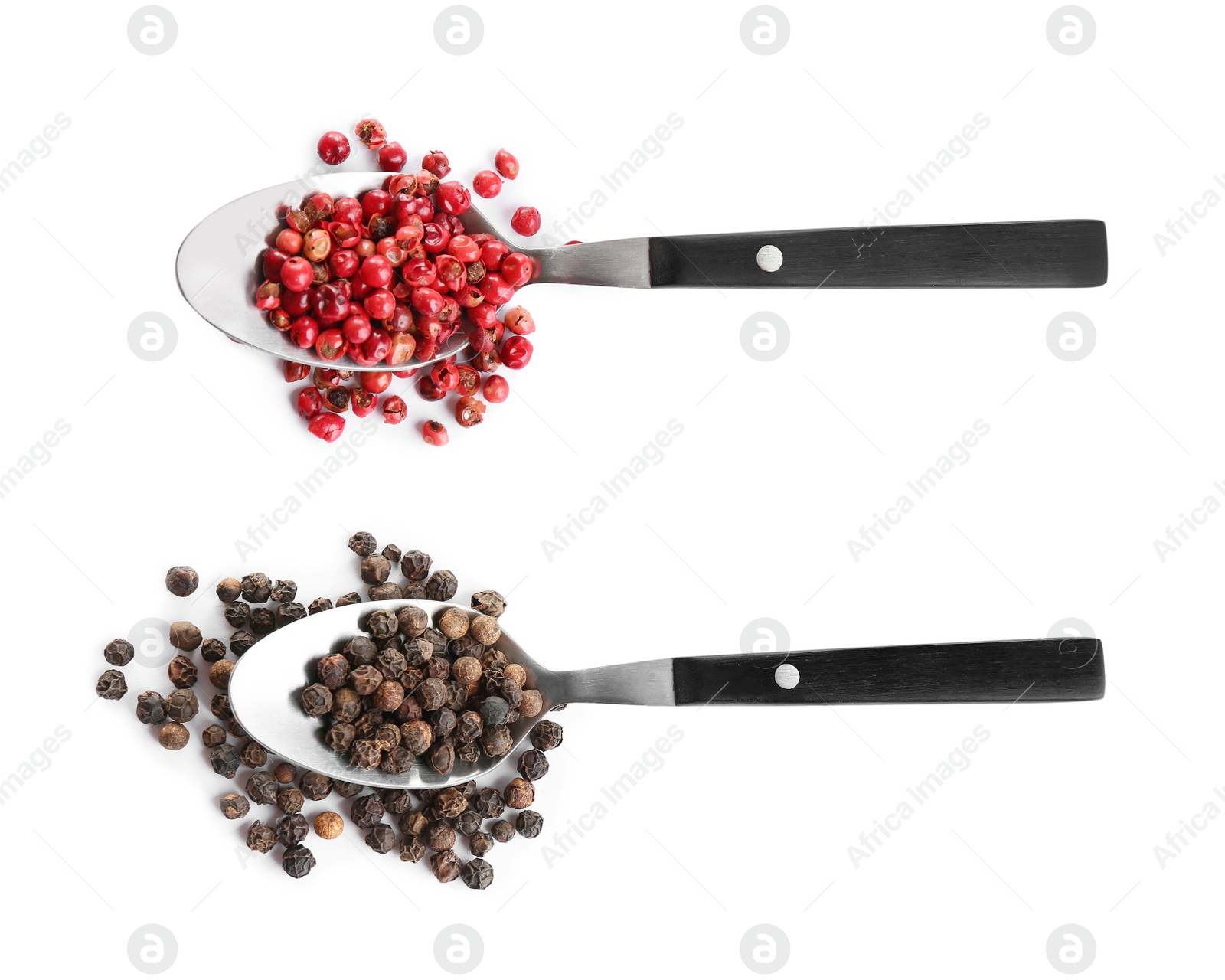 Image of Spoons with red and black peppercorns on white background, top view