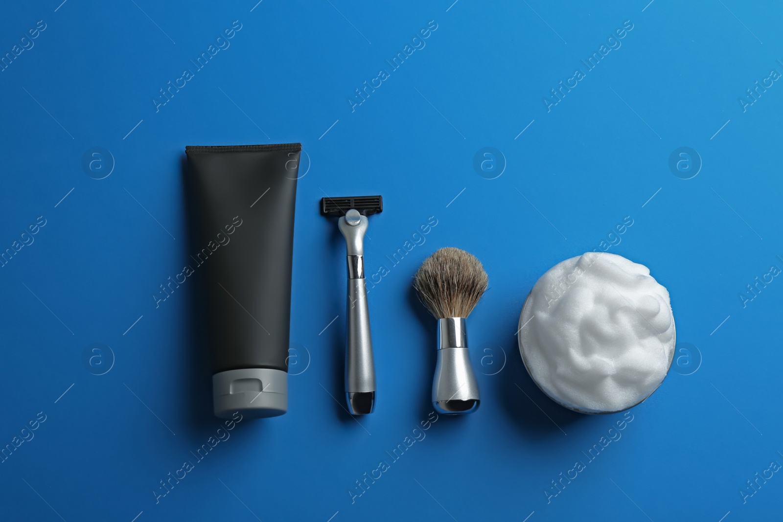 Photo of Flat lay composition with men's cosmetic products on color background. Space for design