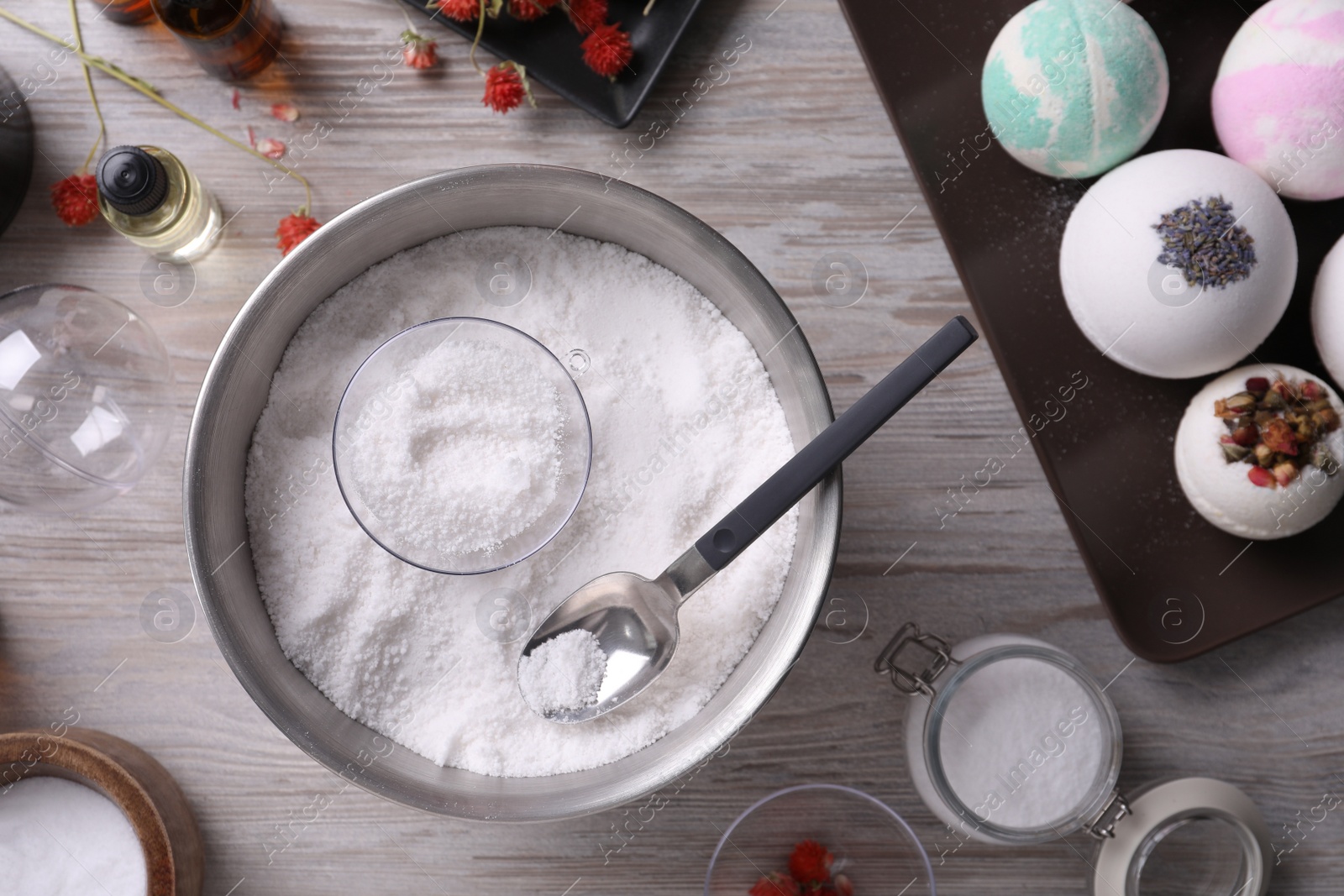 Photo of Flat lay composition with bath bomb ingredients on wooden table