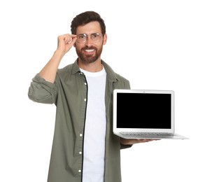 Handsome man holding laptop on white background