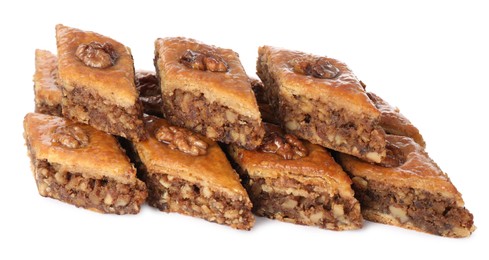 Delicious honey baklava with walnuts on white background