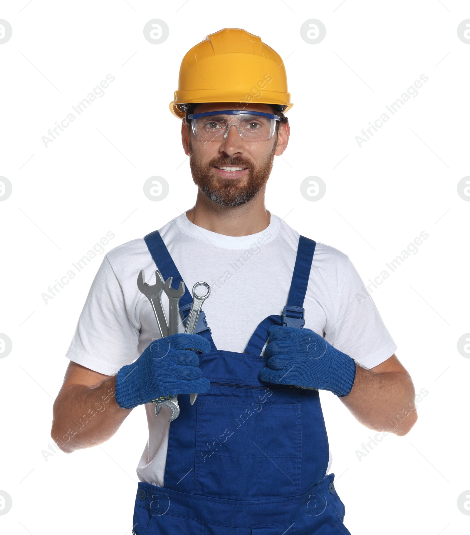 Photo of Professional builder in uniform with tools isolated on white