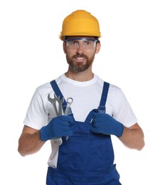 Photo of Professional builder in uniform with tools isolated on white