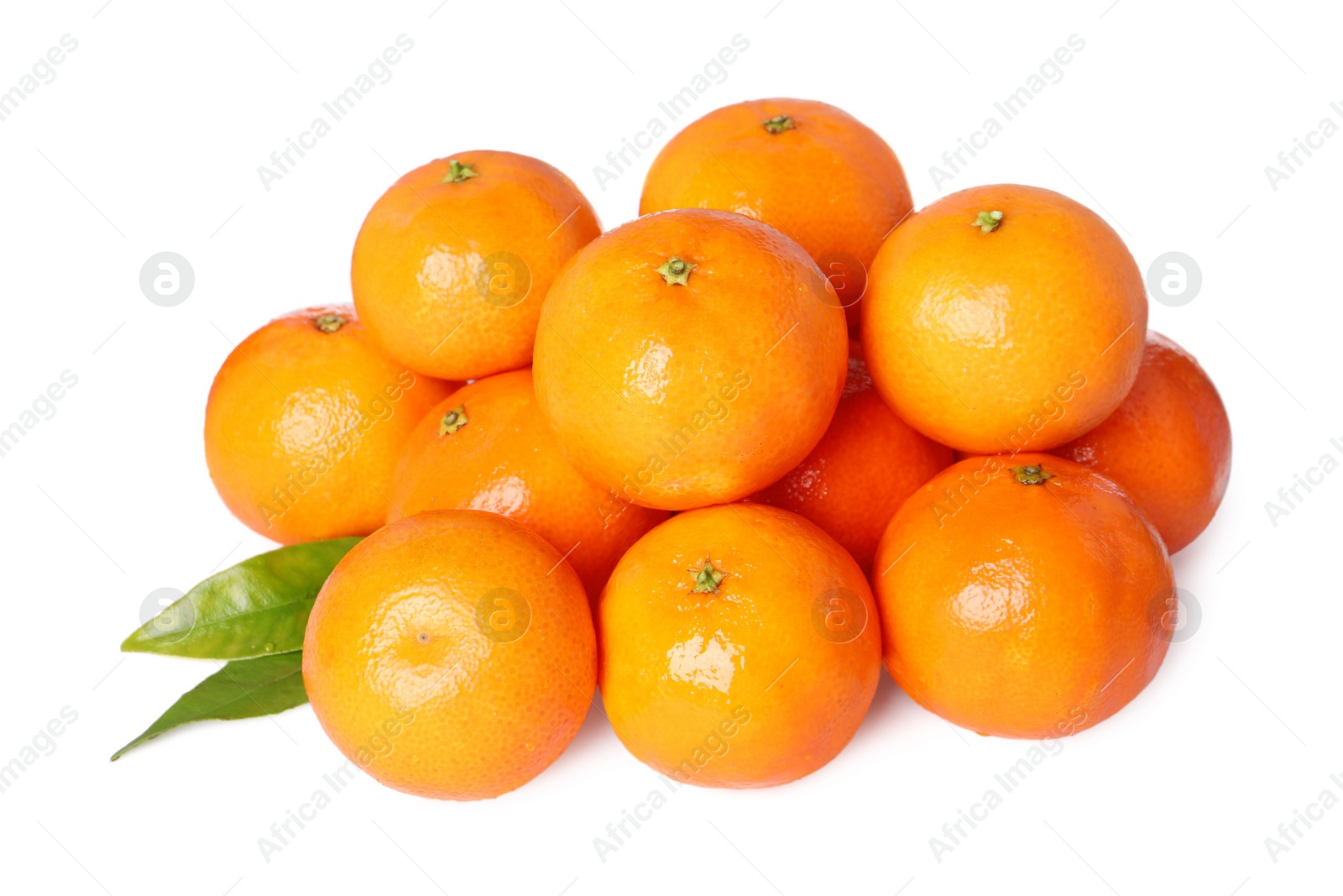 Photo of Fresh ripe tangerines and green leaves isolated on white