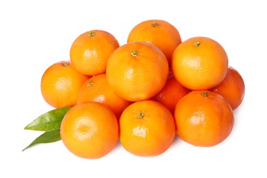 Fresh ripe tangerines and green leaves isolated on white