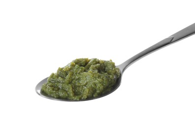 Spoon with green tasty puree on white background