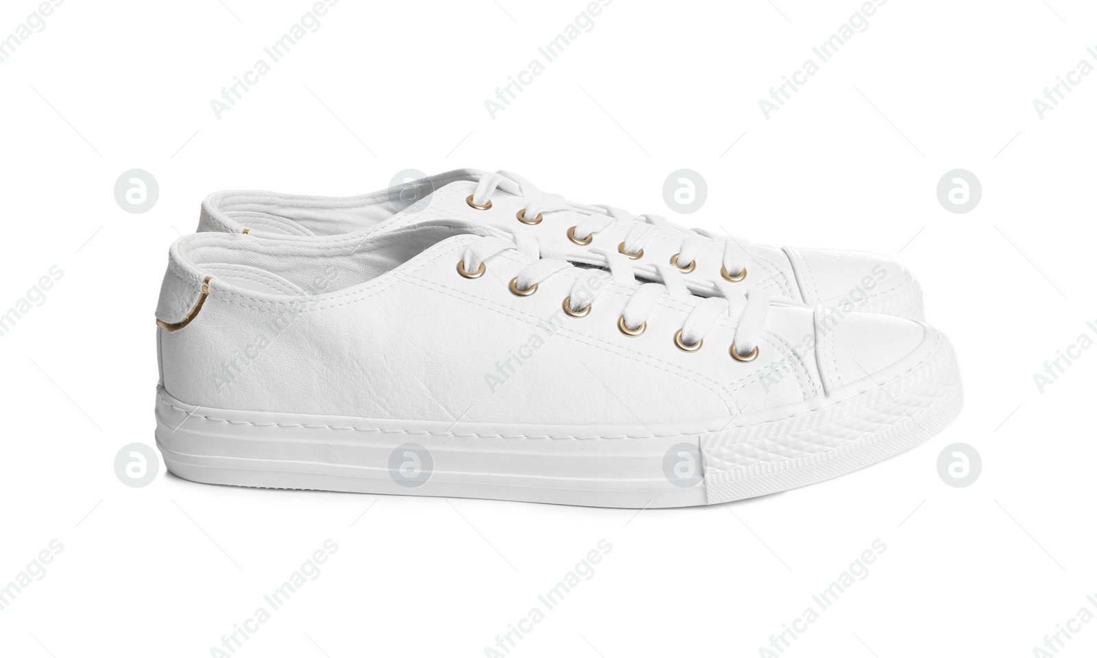 Photo of Pair of stylish sneakers on white background