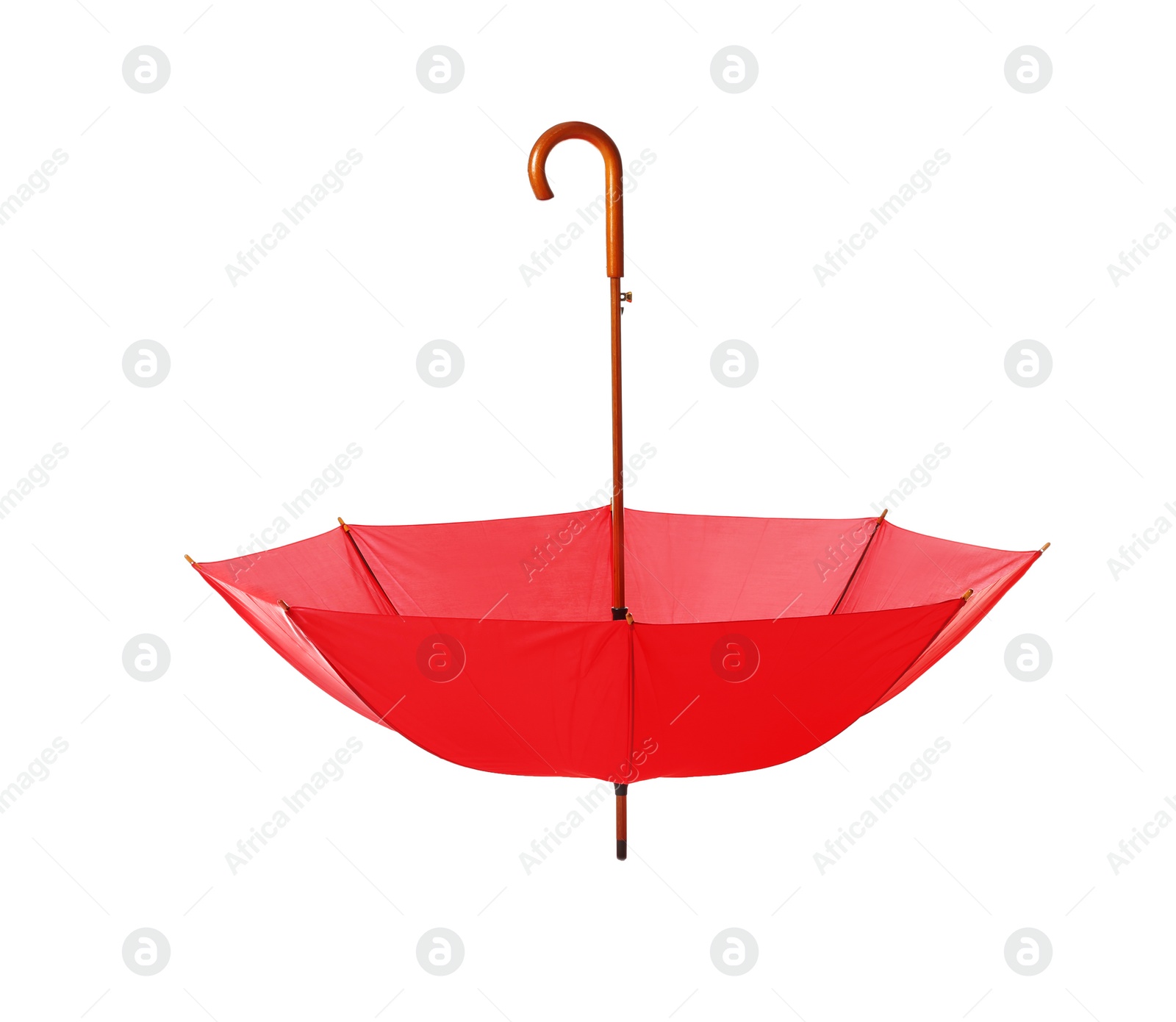 Photo of Modern opened red umbrella isolated on white