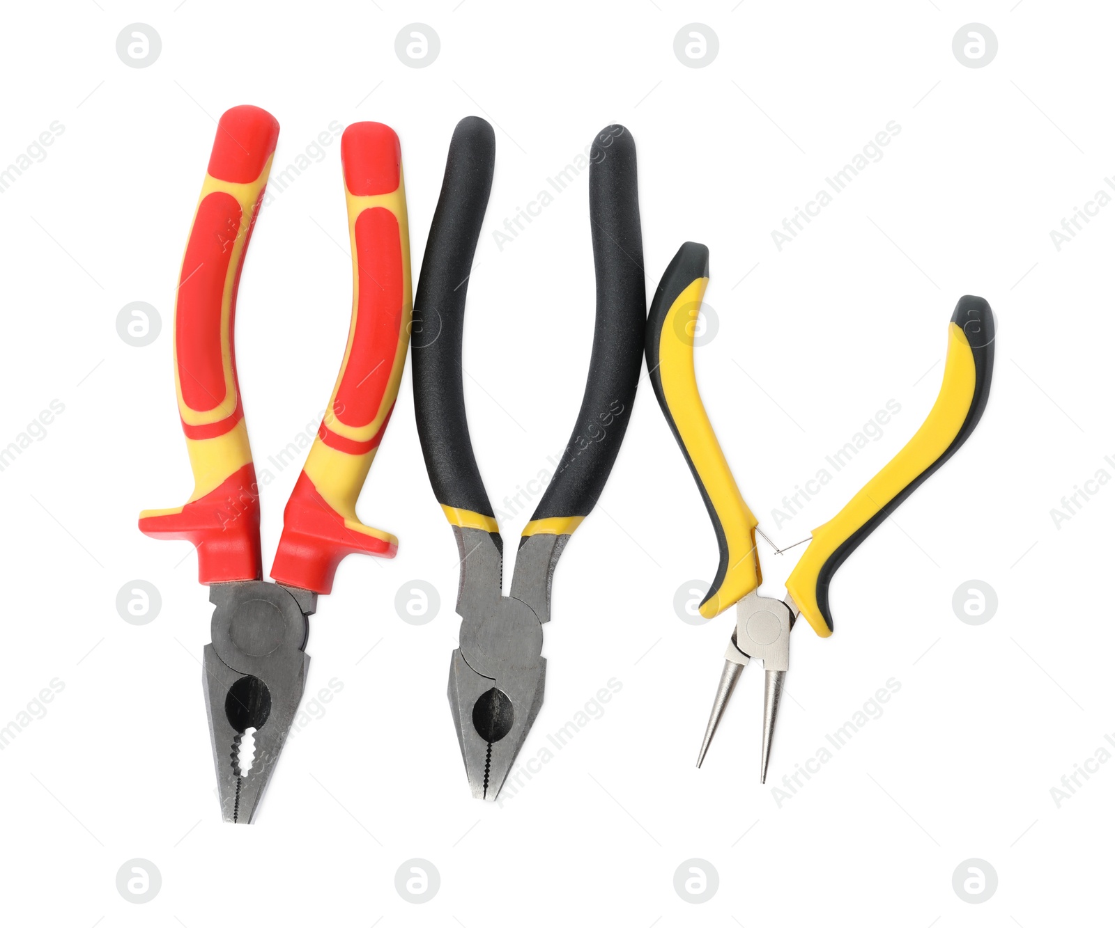 Photo of Group of different pliers isolated on white, top view