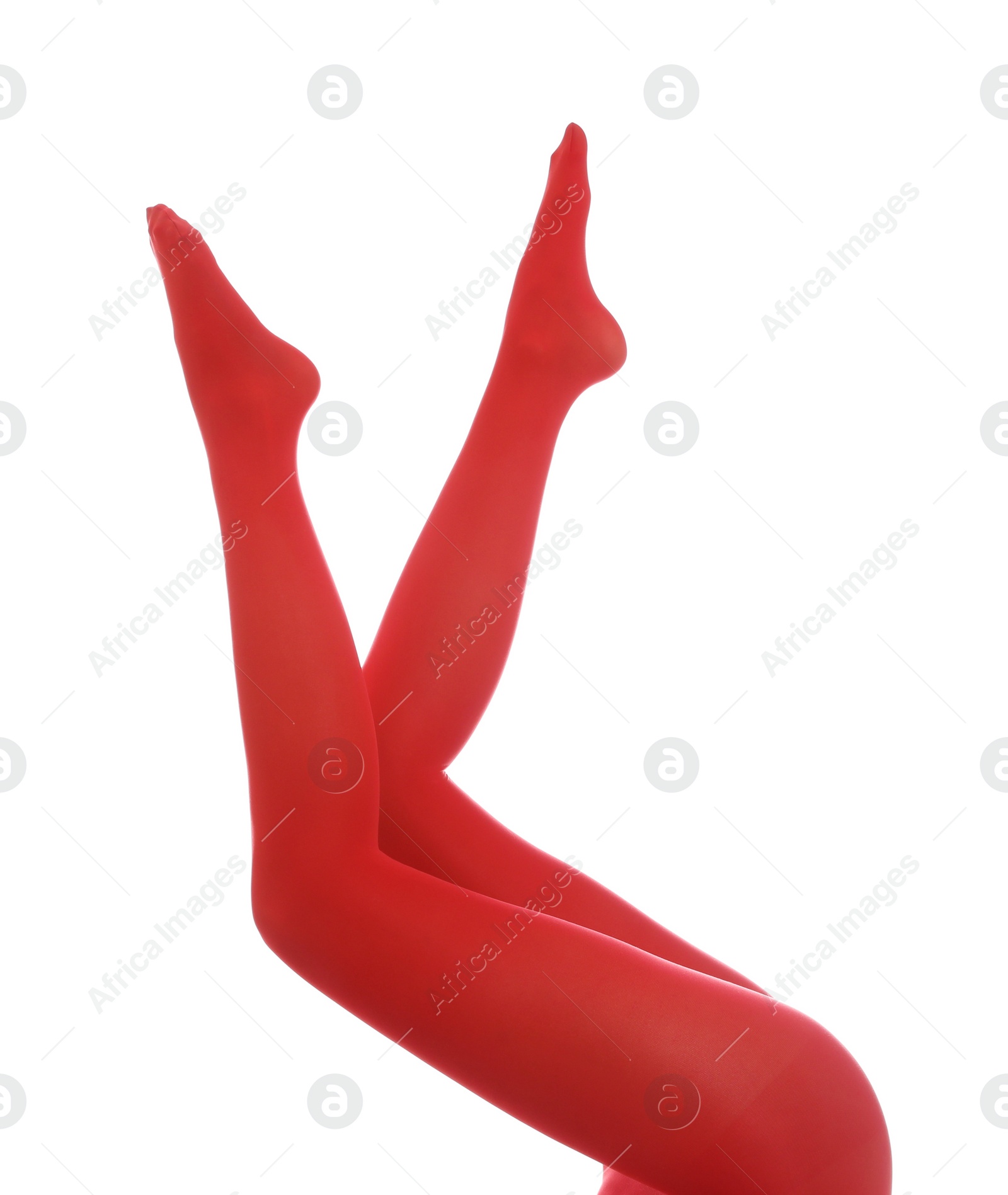 Photo of Woman wearing red tights on white background, closeup of legs