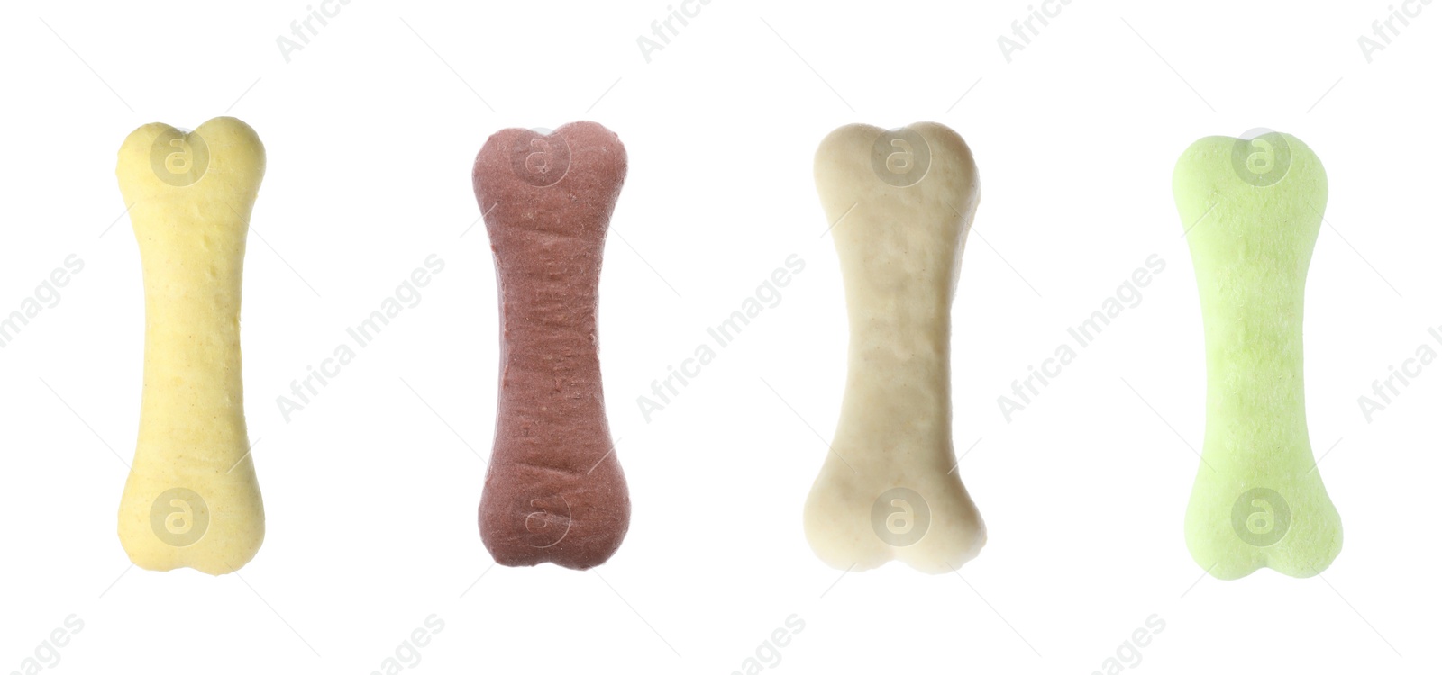 Image of Set of different bone shaped dog cookies on white background. Banner design