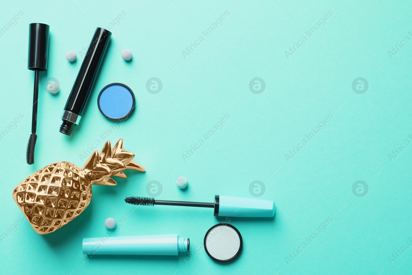 Photo of Flat lay composition with decorative cosmetics on color background