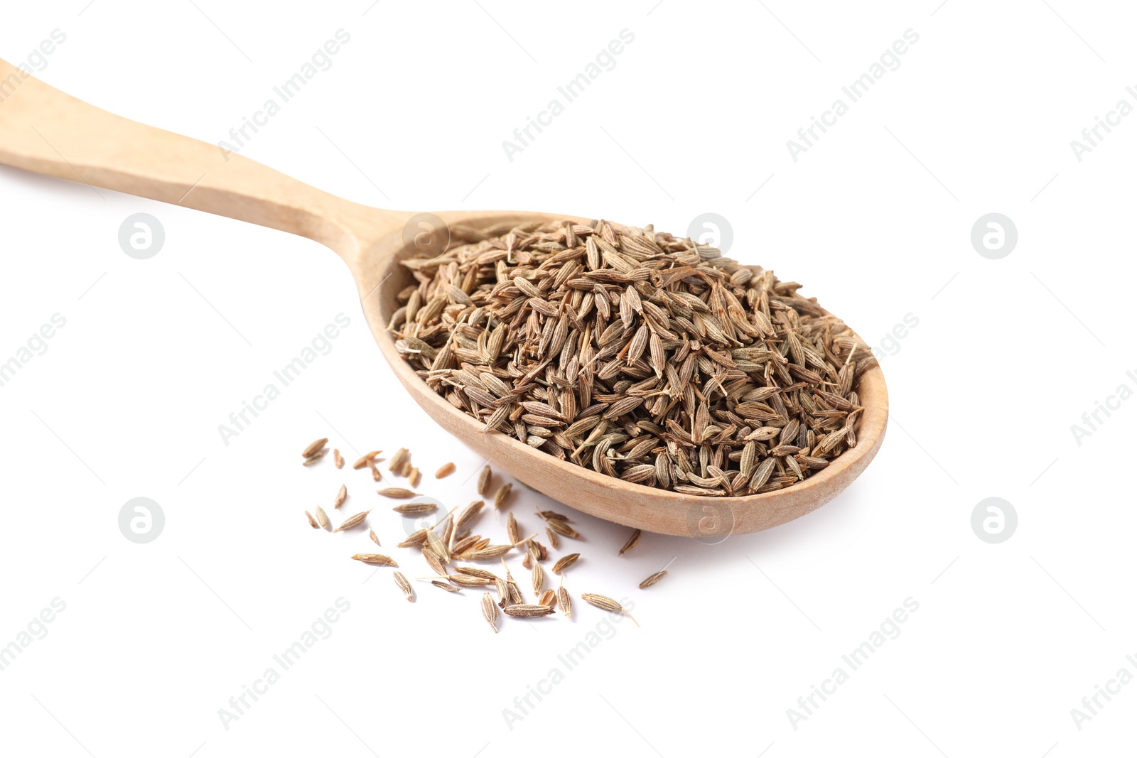 Photo of Spoon of aromatic caraway (Persian cumin) seeds isolated on white