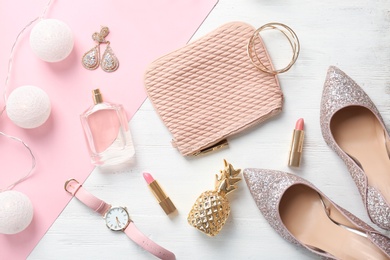 Photo of Flat lay composition with cosmetics and stylish accessories on light background