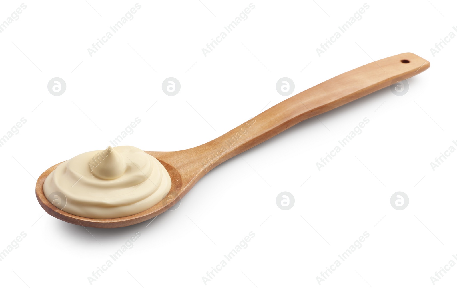 Photo of Natural yogurt in wooden spoon isolated on white