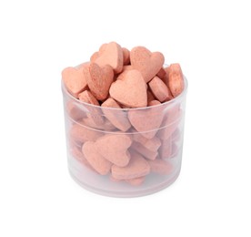 Heart shaped vitamins for pets in plastic container isolated on white