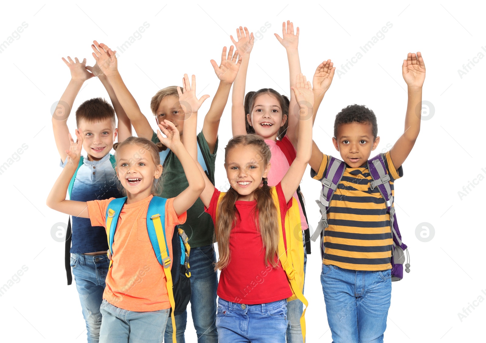 Photo of Group of little school children with backpacks on white background