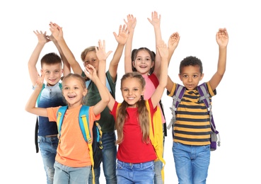 Photo of Group of little school children with backpacks on white background