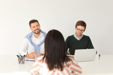 Human resources commission conducting job interview with applicant in office