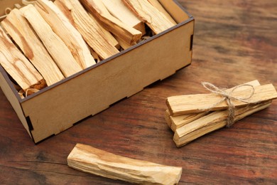 Photo of Palo Santo (holy wood) sticks on wooden table