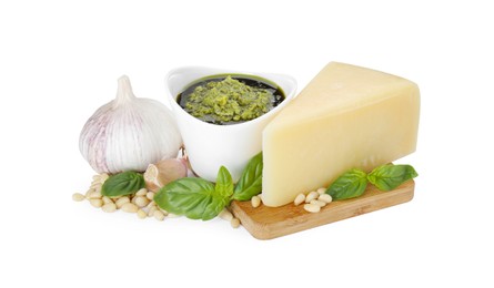 Photo of Tasty pesto sauce in bowl and ingredients on white background