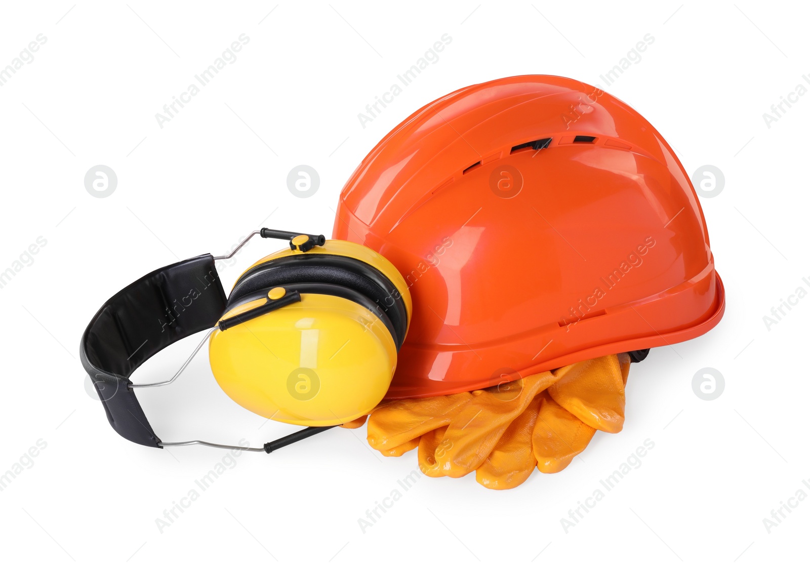 Photo of Hard hat, earmuffs and gloves isolated on white. Safety equipment