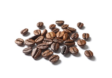 Pile of roasted coffee beans on white background