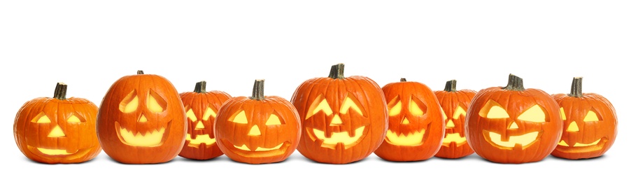 Image of Set of carved Halloween pumpkins on white background. Banner design